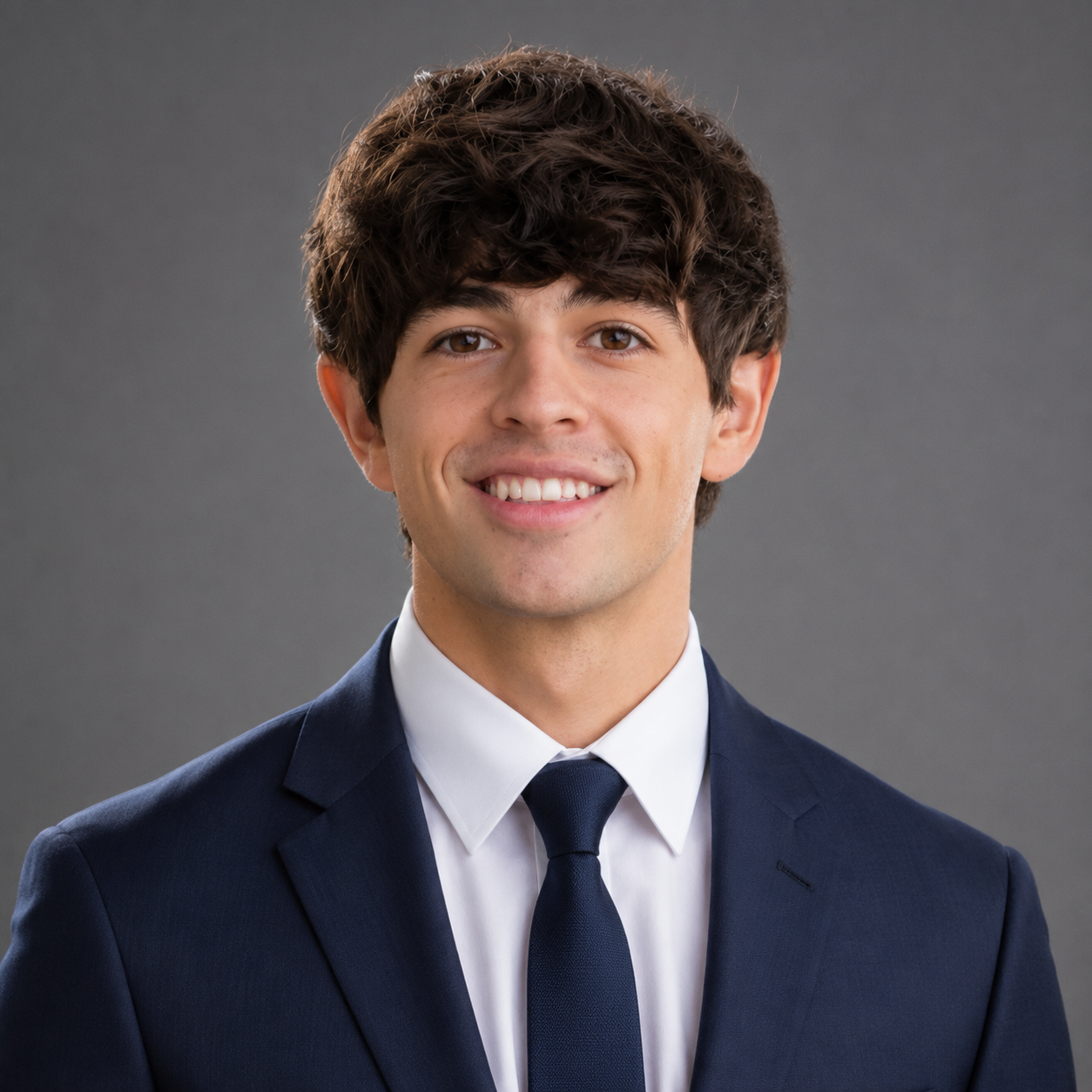 Professional headshot of Charles