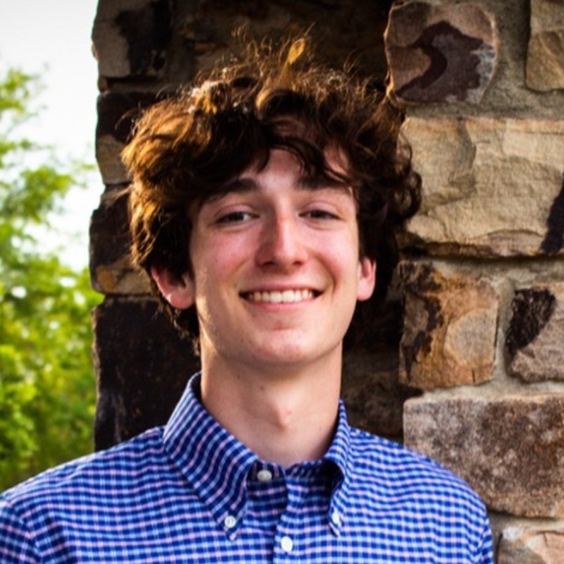 Professional headshot of Charles